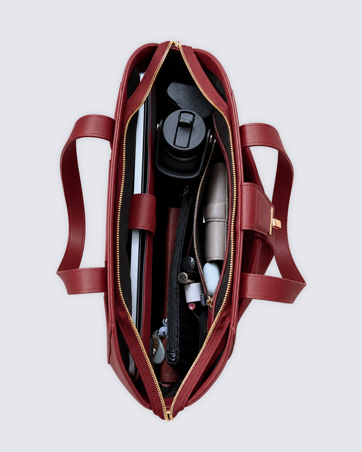 The Fiora Tote in Cherry Red, open and packed, from above