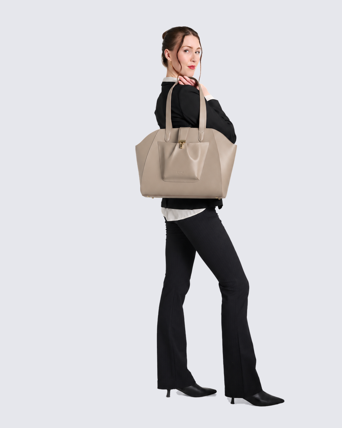 The Fiora Tote in Oat, on the shoulder