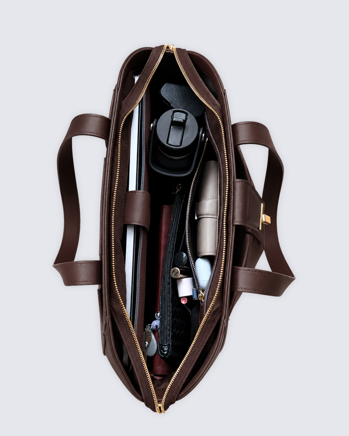 The Fiora Tote Travel Edition in Dark Brown, open and packed, from above