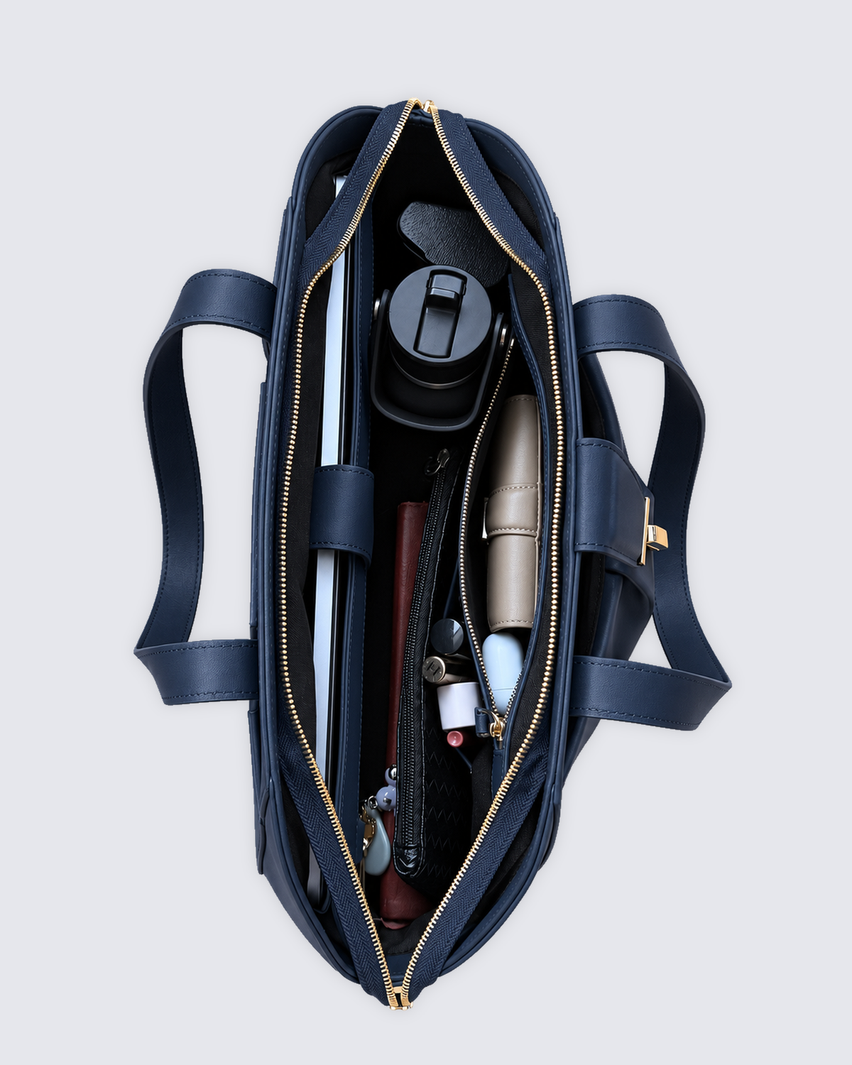 The Fiora Tote Travel Edition in Navy Blue, open and packed, from above